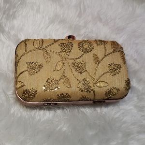 Gold clutch